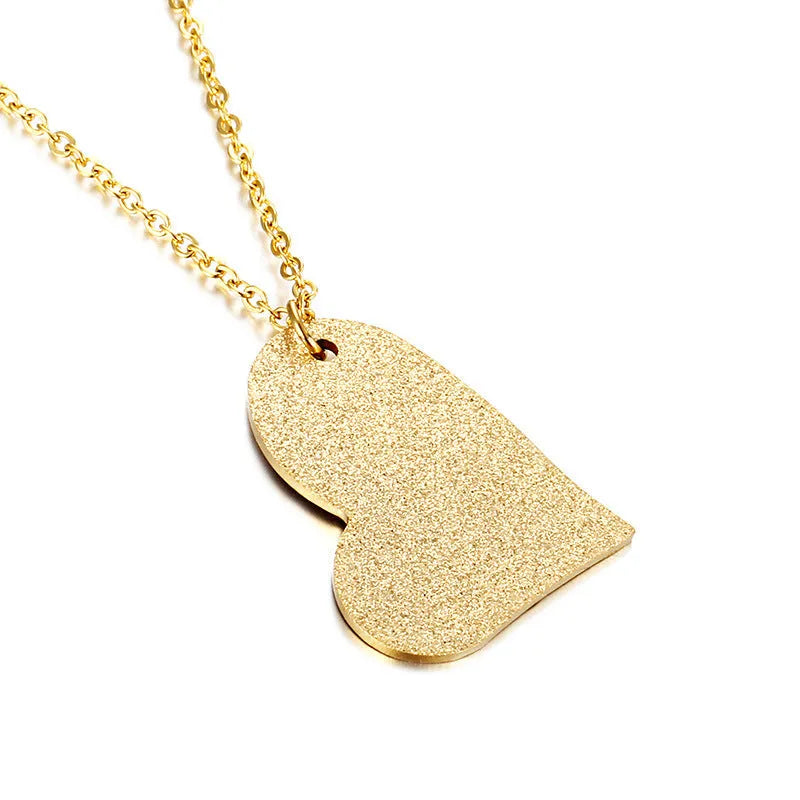 Silver geometric heart pendant necklace on a 45 cm titanium steel chain.