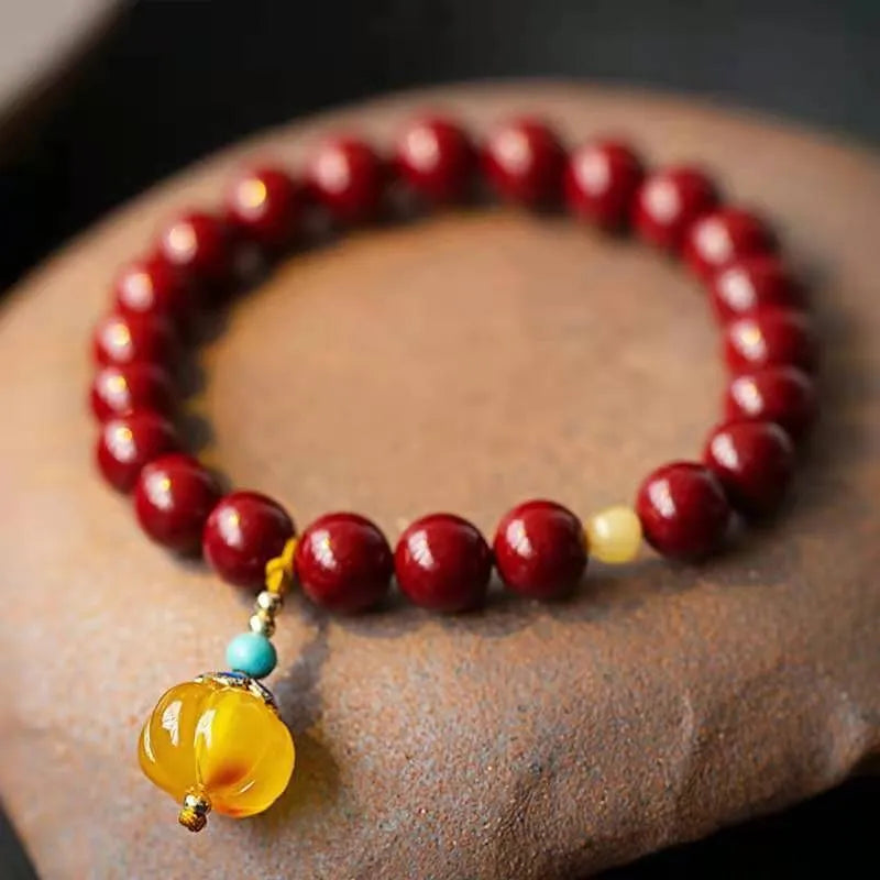 Gold cinnabar wave bracelet with manual processing and national style elements