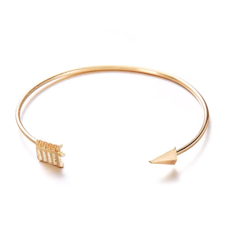 Women's vintage cuff arrow knotted bracelet in gold electroplated alloy