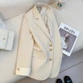 Women's Korean style loose fit polyester trench coat in milky white showing medium length and pocket details