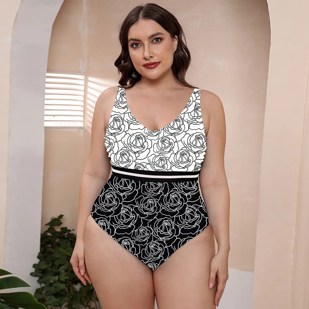 Blue printed spaghetti strap one-piece swimsuit with a striped vest design on a mannequin.