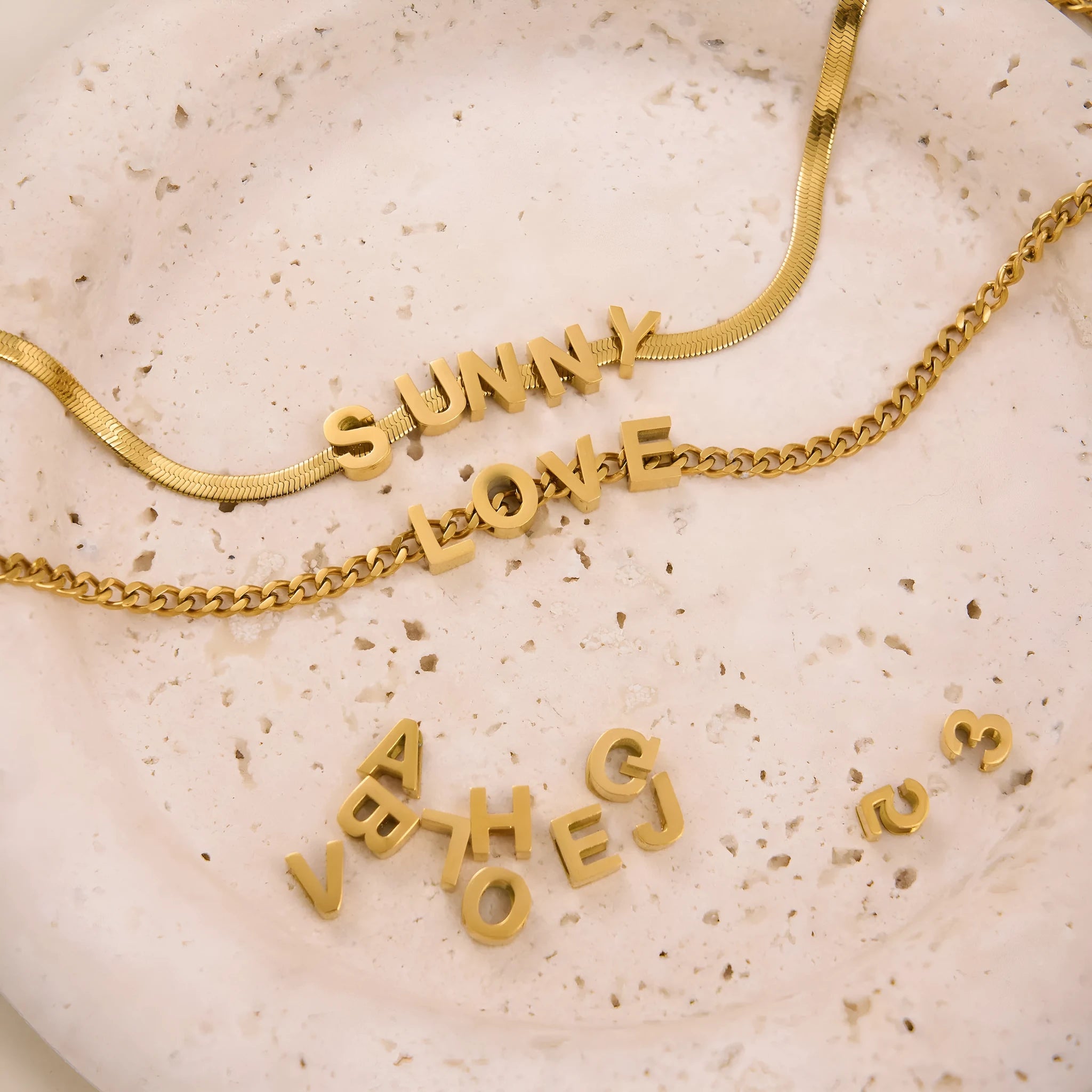Titanium steel personalised necklace with a charm showing the letter A on a 40.5cm chain.