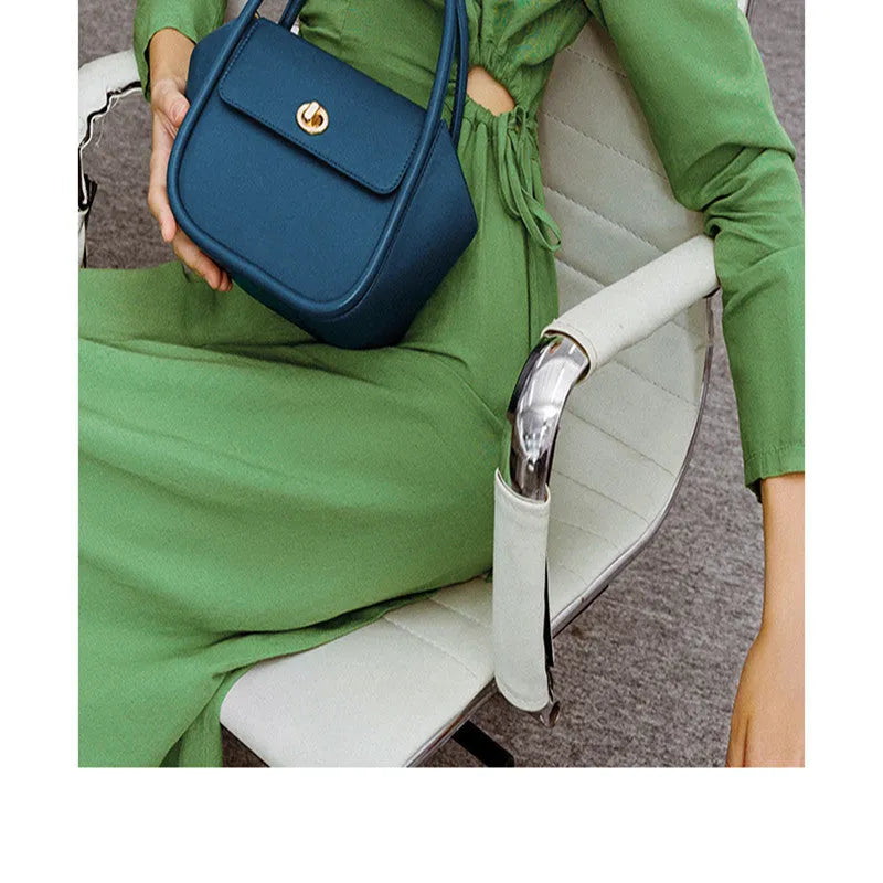 Leather wing-shaped tote cross-body bag in cow leather with single shoulder strap