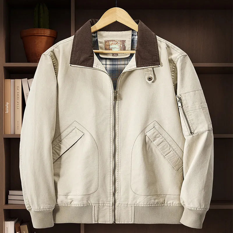 Men's plus-size washed cotton baseball flight jacket in army green, shown on a hanger.