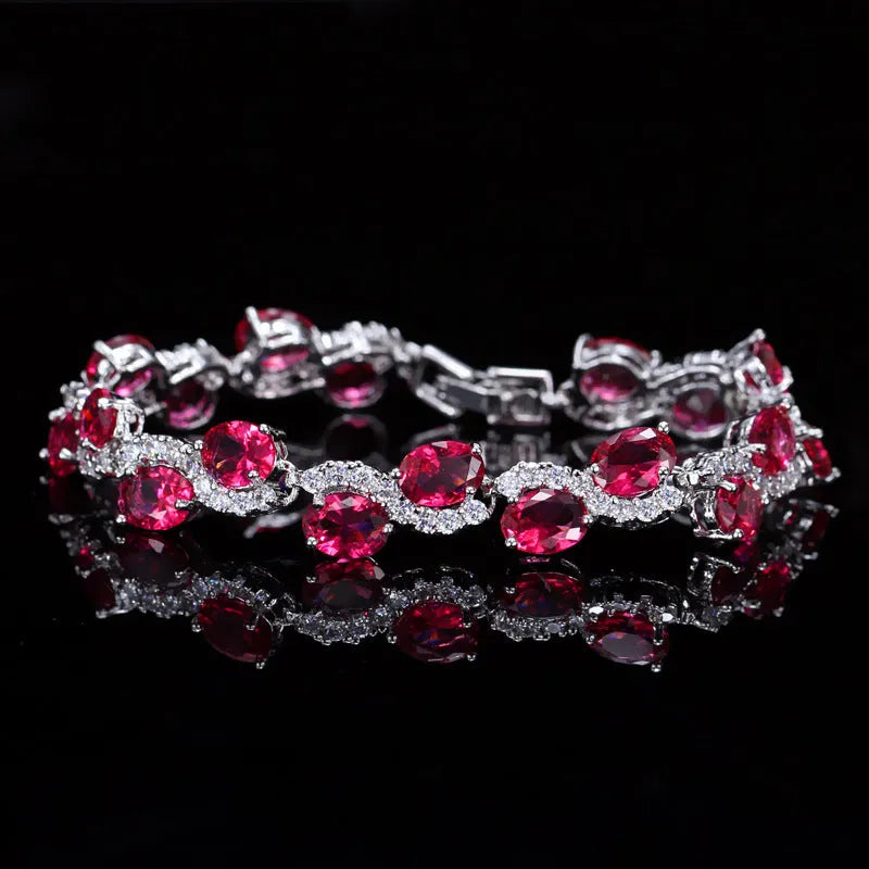 Copper gold plated bracelet with AAA+ zircon stones showing geometric design and 18.4 cm length