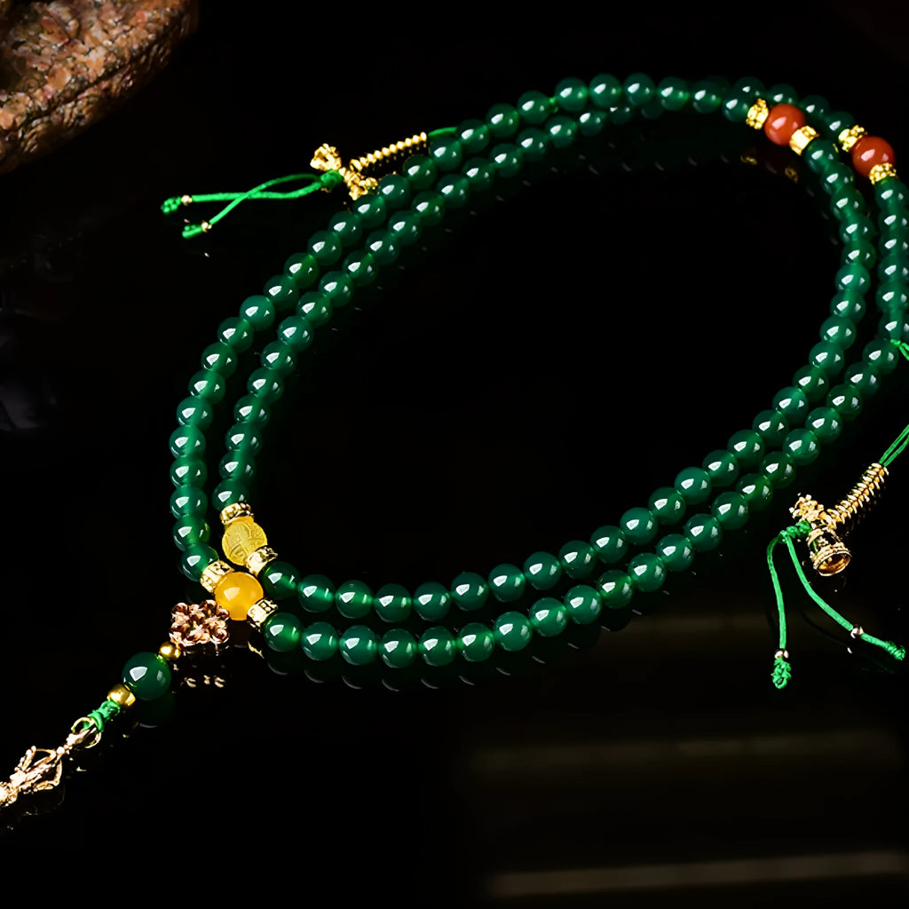 Handmade green agate multi-strand bracelet for men and women on a white background.