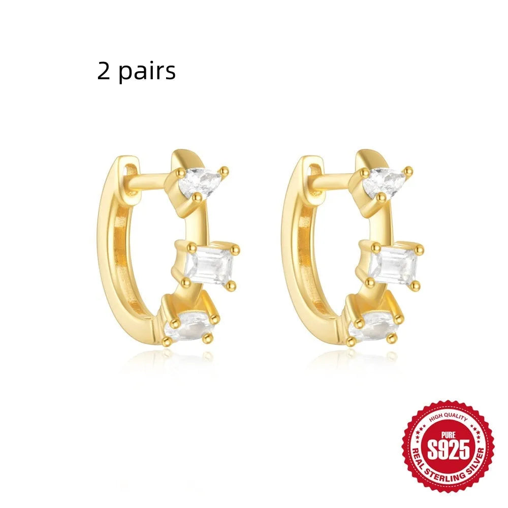 Sterling silver geometric stud earrings with small round diamond accent in gold or silver finish