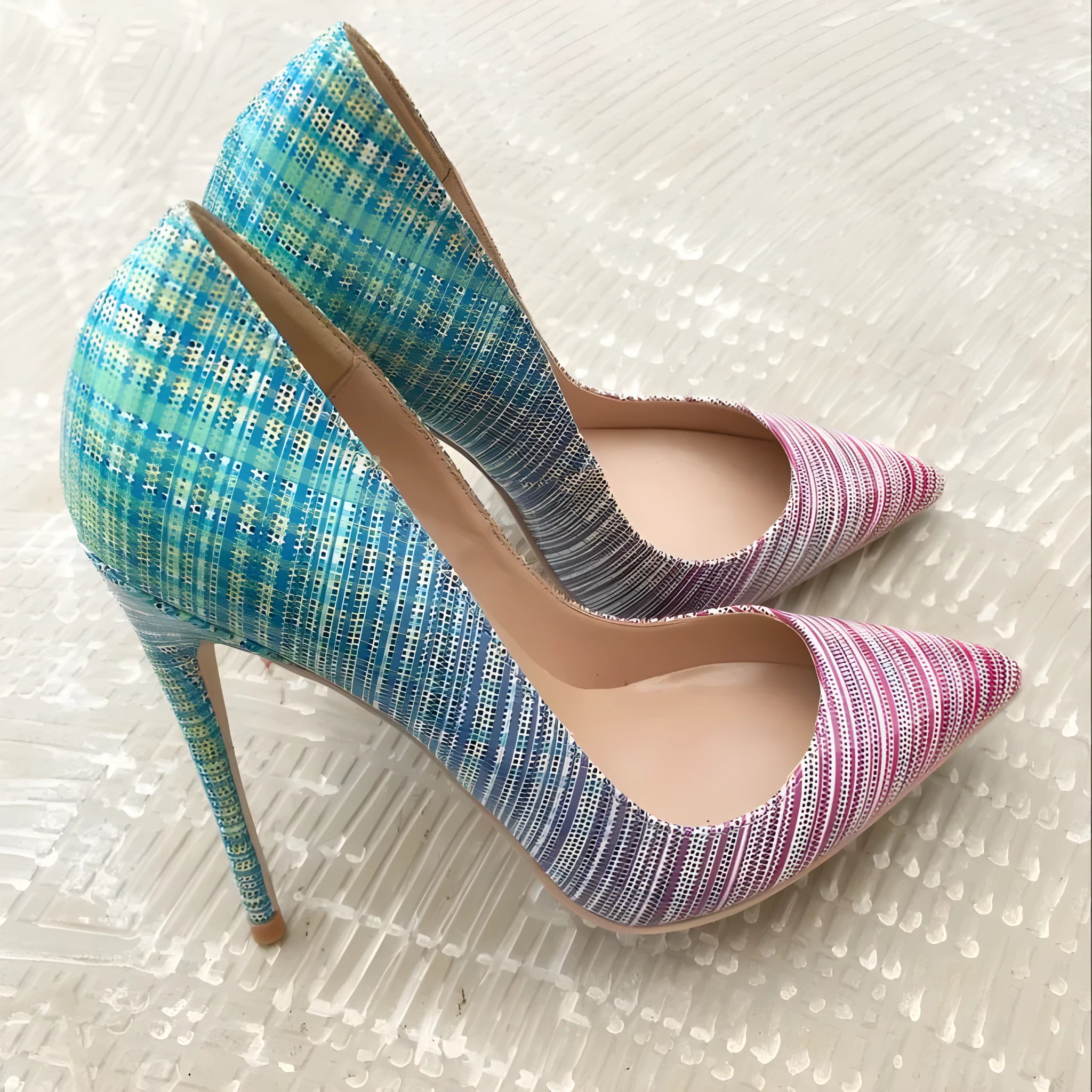 Pink and blue gradient patent leather ladies stiletto heels with pointed toe and thin high heel.