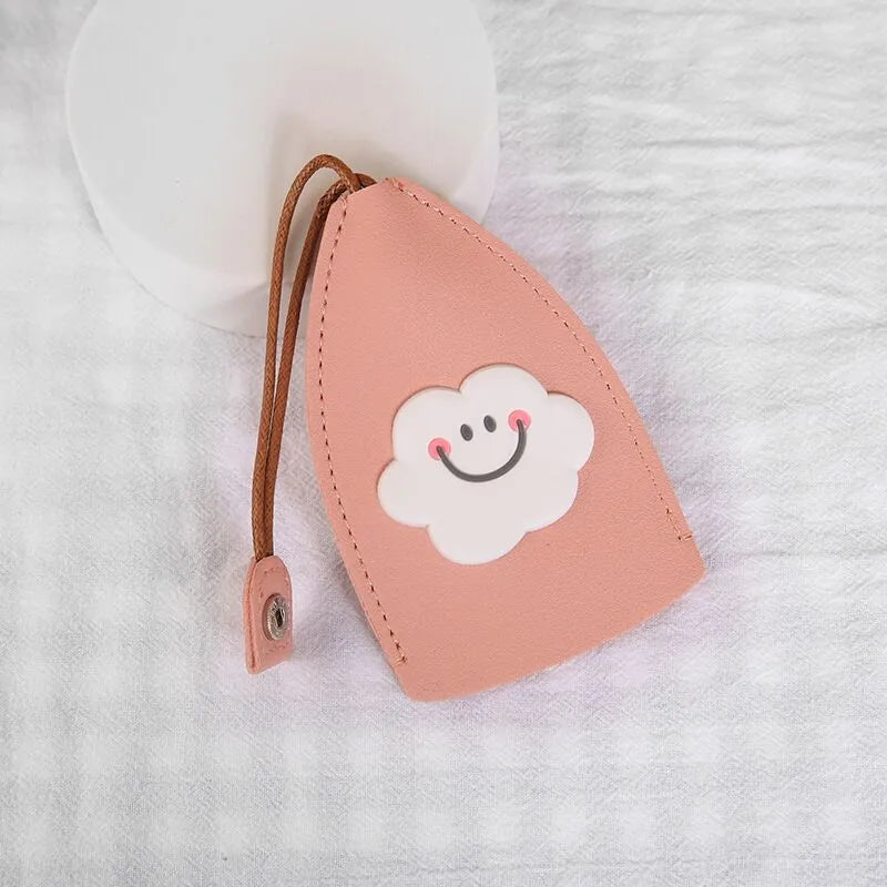 Cartoon pull-out key case in PU leather with colourful design, showing compact 14cm by 7.5cm dimensions