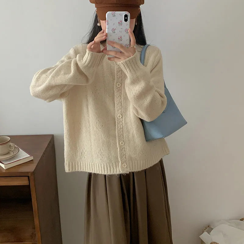 Artistic retro loose-fit Korean sweater coat in viscose fibre, shown in apricot colour.