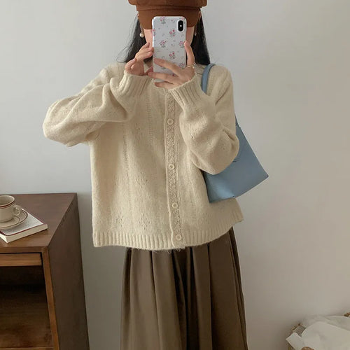 Artistic retro loose-fit Korean sweater coat in viscose fibre, shown in apricot colour.