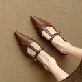 Women's brown pointed toe low-cut flat shoes in cowhide leather with metal details