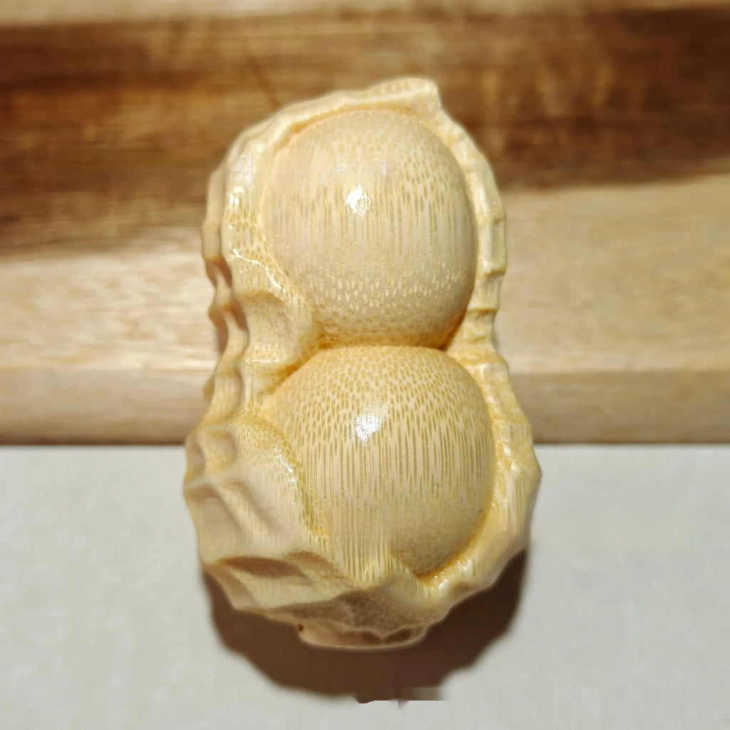 Solid bamboo peanut ornament carving with May Good Things Happen message