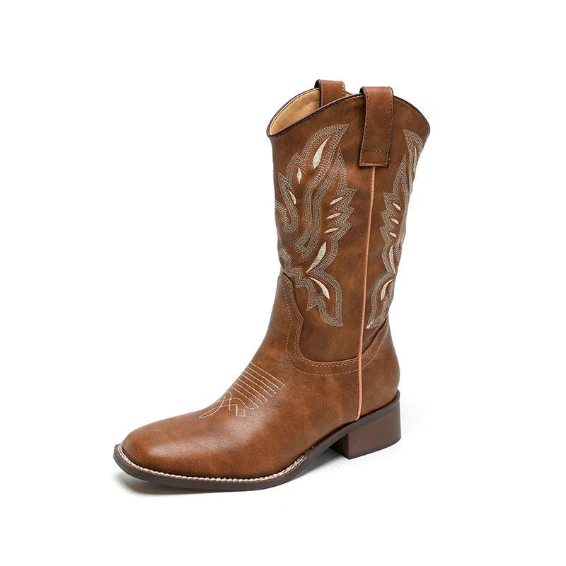 Brown women's embroidered mid-calf martin boots with leather lining and a square heel.