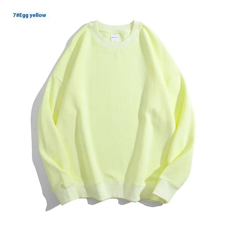 Women's loose fit cotton off shoulder sweater in a solid colour with round neck and long sleeves.