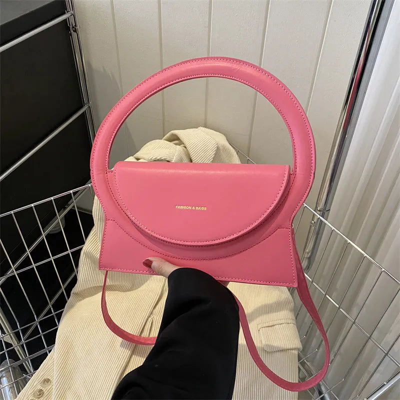 Horizontal square messenger bag in multiple colours with sandwich pocket design and stitching details
