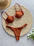 Women's underwire bikini swimsuit in black, khaki and white colours with European styling
