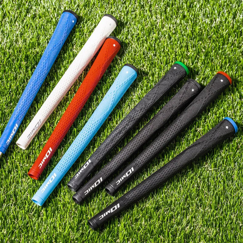 TPE rubber golf club grip in assorted colours including pink, red, blue, white, and black with coloured head accents.