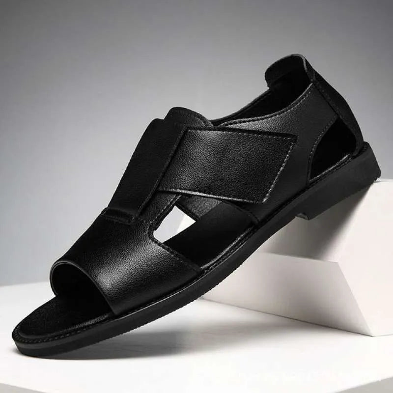 Men's black and brown Roman-style open-toe sandals with a leather upper and rubber sole.