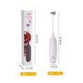 Handheld electric milk frother in black and white colours for making coffee and hot chocolate foam.