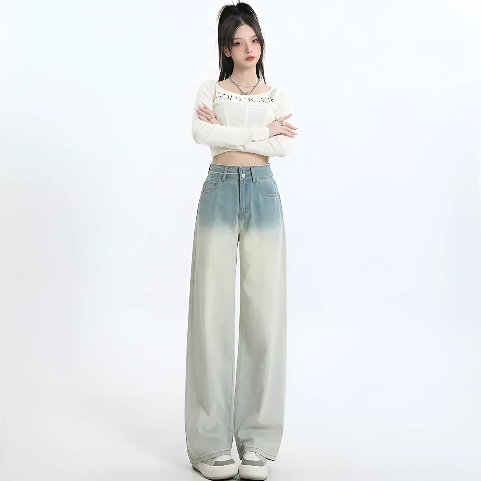Women's straight-leg cotton denim trousers in a gradient blue colour with a wide leg fit.