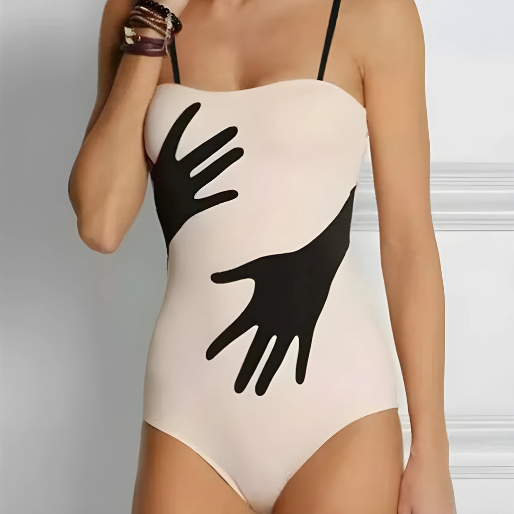 Women's one-piece polyester bikini swimsuit for the beach, available in sizes S to XL.