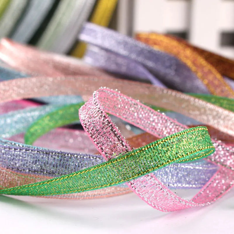 Roll of narrow 0.6cm wide polyester satin ribbon in a choice of colours, showing 22 metre length.