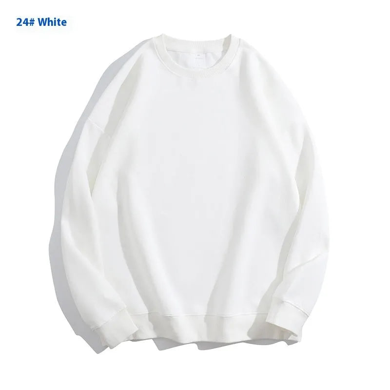 Women's loose fit cotton off shoulder sweater in a solid colour with round neck and long sleeves.