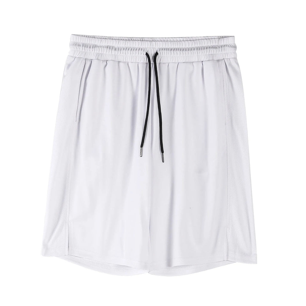 Man wearing black quick-dry mesh fitness shorts with a loose, casual fit and elasticated waistband.