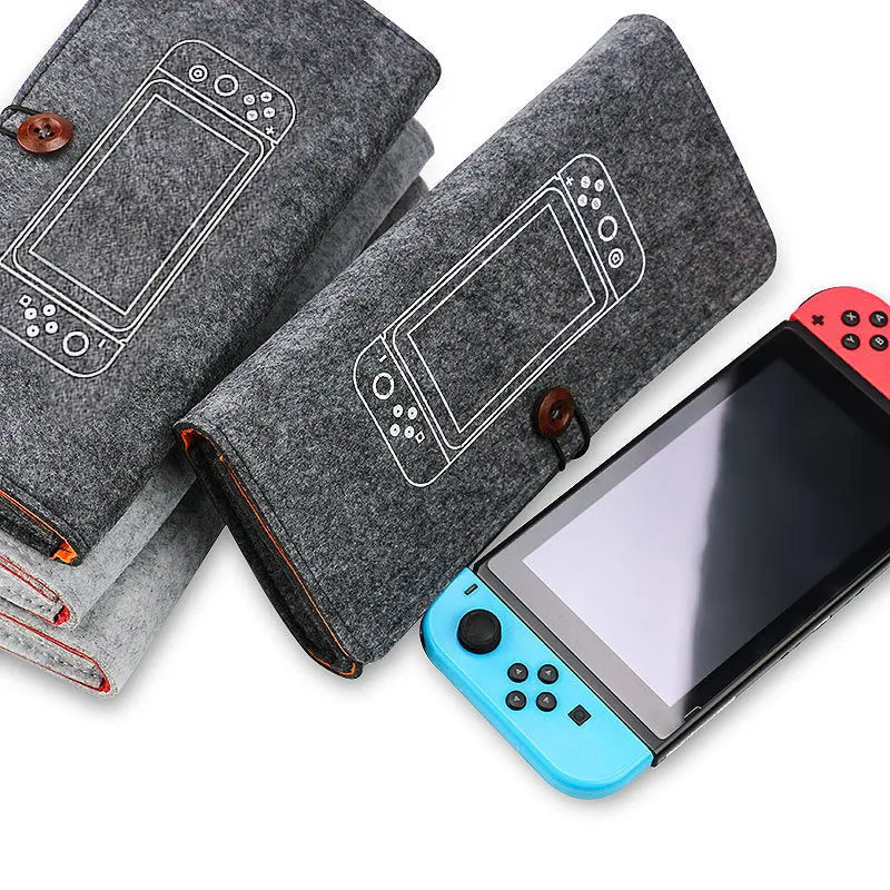 Black felt carrying pouch for Nintendo Switch console with game card slots and double storage layers.