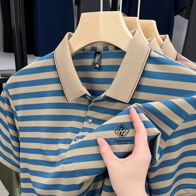 Man wearing a red striped casual short sleeve shirt with a mosaic pattern detail.