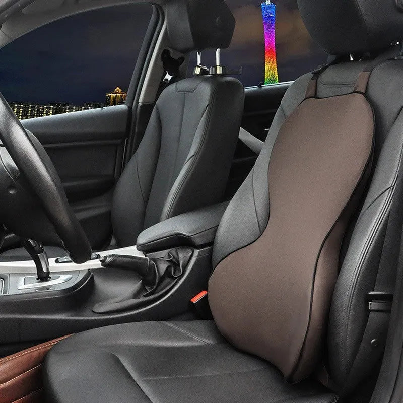 Memory cotton car lumbar support cushion in a neutral colour on a car seat.