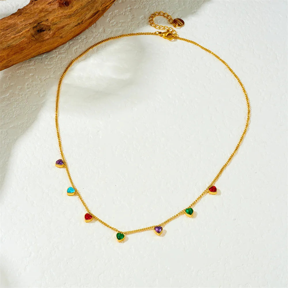 Gold-coloured heart pendant necklace for women on an adjustable chain.