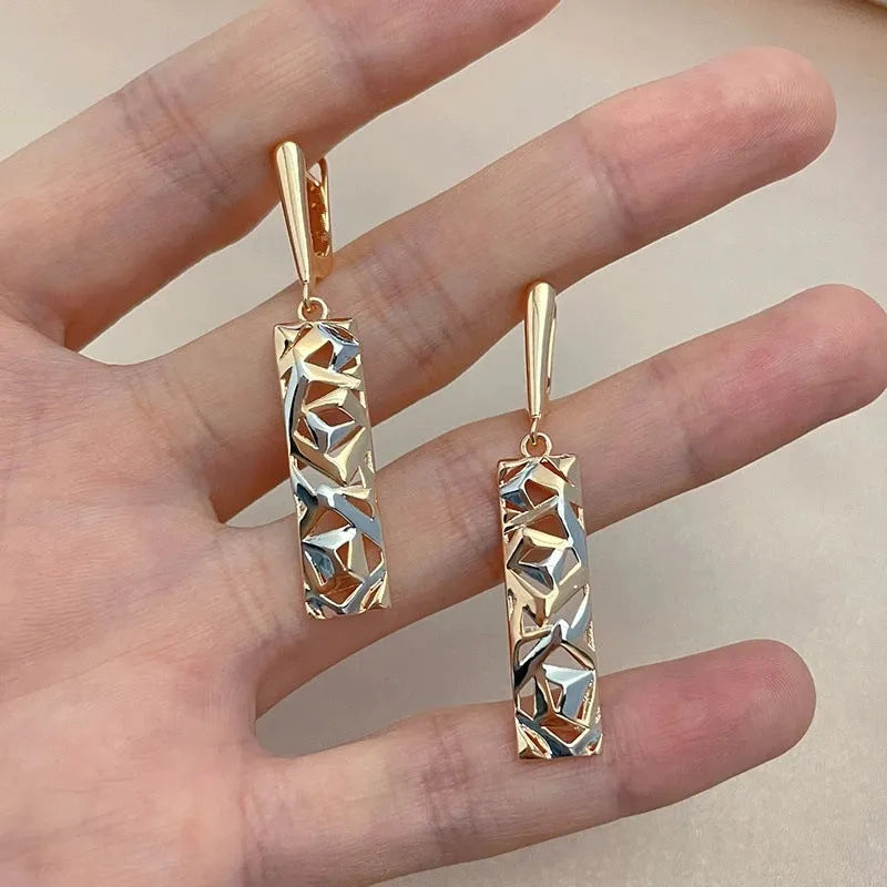 Rectangular two-tone hollow stud earrings with geometric design and electroplated alloy construction