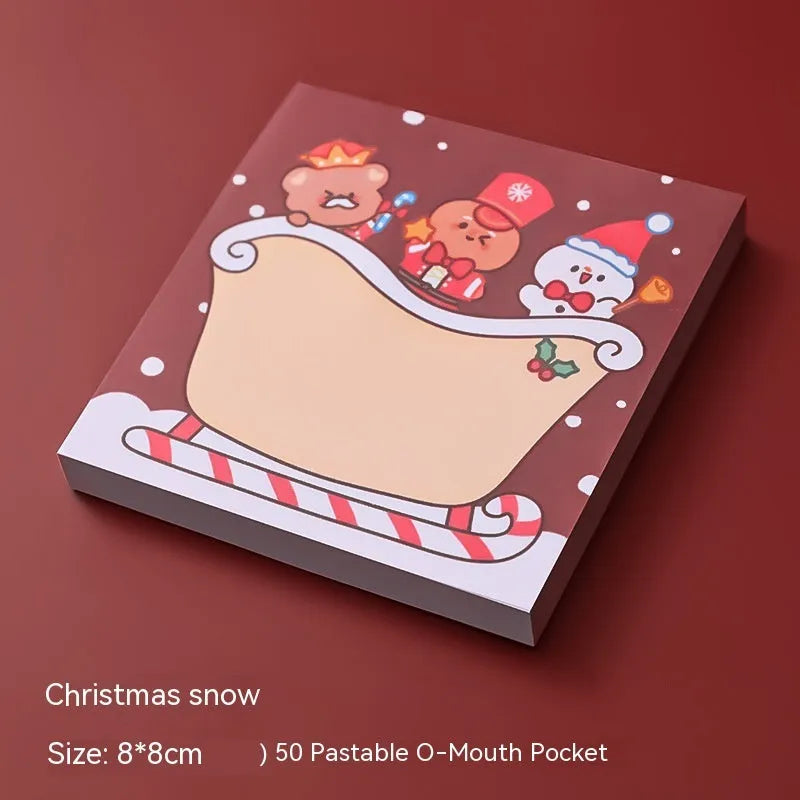 Christmas sticky notes book showing cartoon designs of Elf, Gift, Sled, Ball, Santa, House, Bear, and Snowman