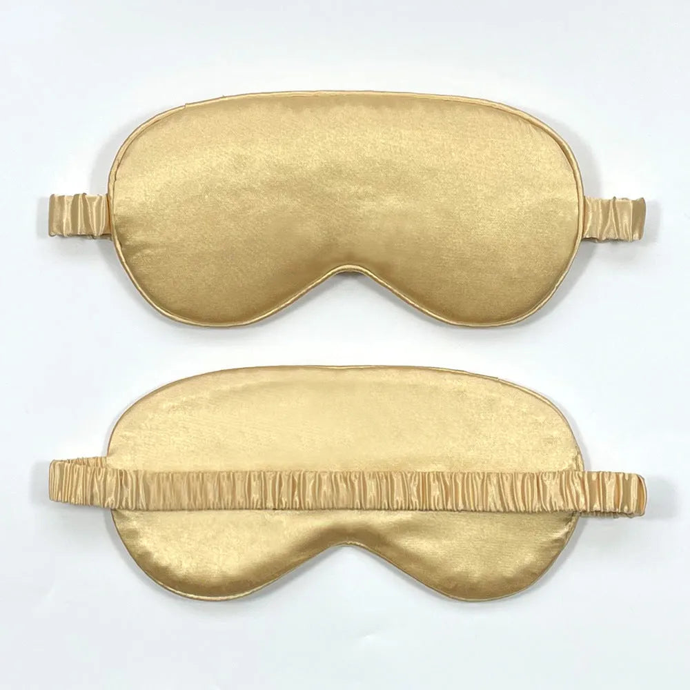 Double-sided Rayon elastic satin sleep mask shown in multiple colour options including sky blue, black, wine red, and light pink.