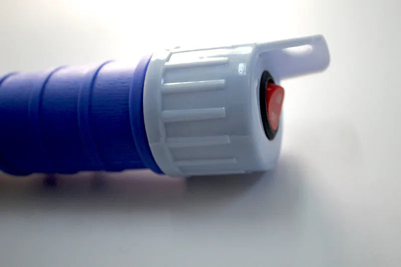 Blue and red manual hand pump for siphoning fuel and oil from containers