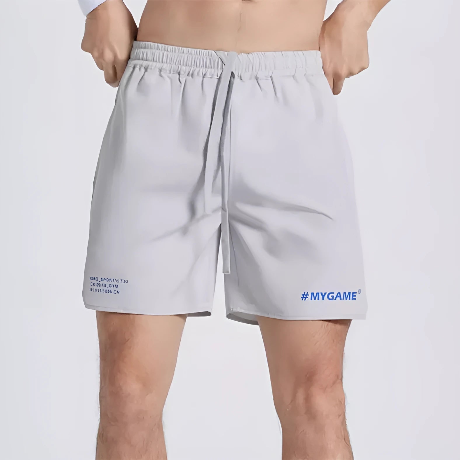 Men's training shorts in black, blue, grey, and white colours from a front view.