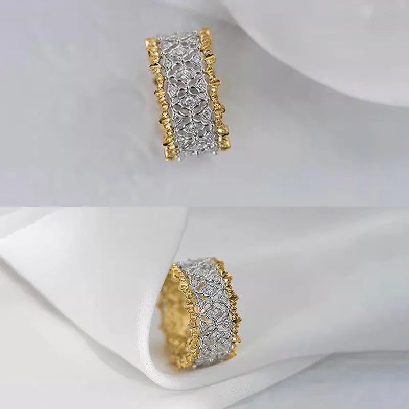 Geometric round two-tone gold zircon ring on a plain background, showing its electroplated copper construction.