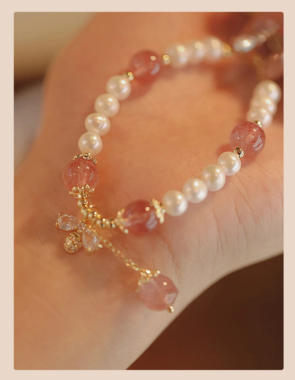 Crystal bracelet with strawberry quartz stringed pearls and bow detail for female summer wear