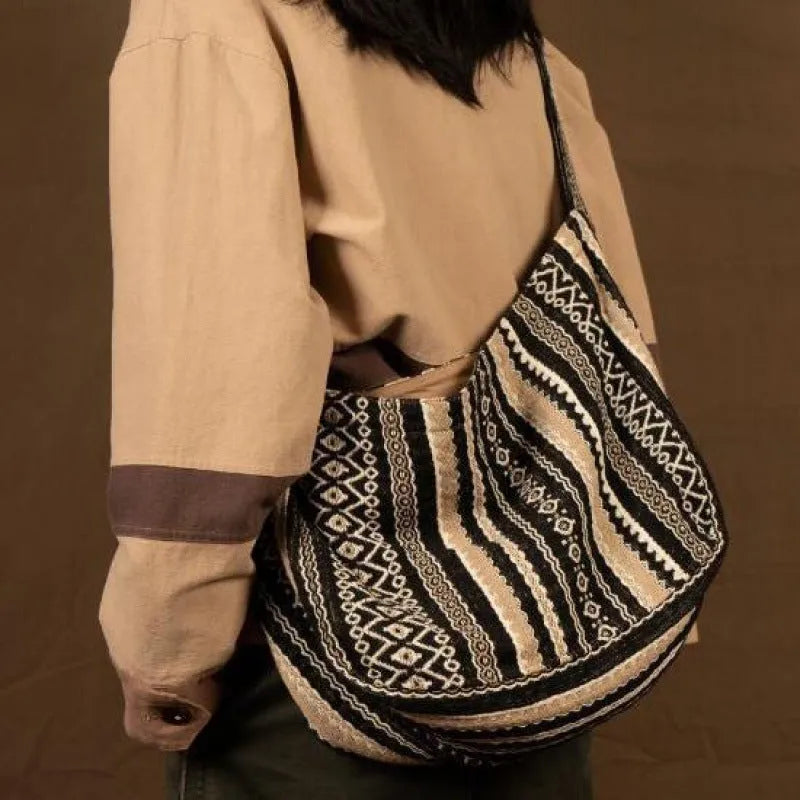 Corduroy vintage messenger bag with jacquard stripe pattern and adjustable plaid shoulder strap
