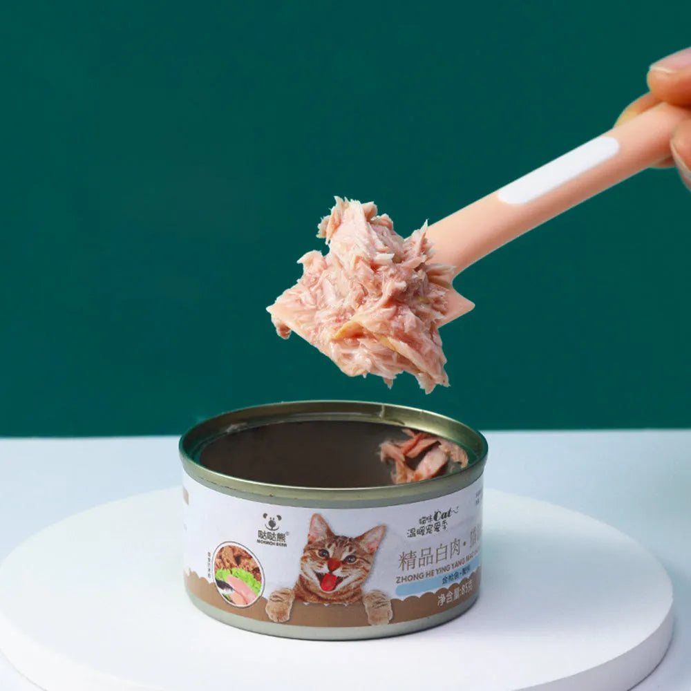 Long-handled green pet food spoon for canned wet food with angled scraper design