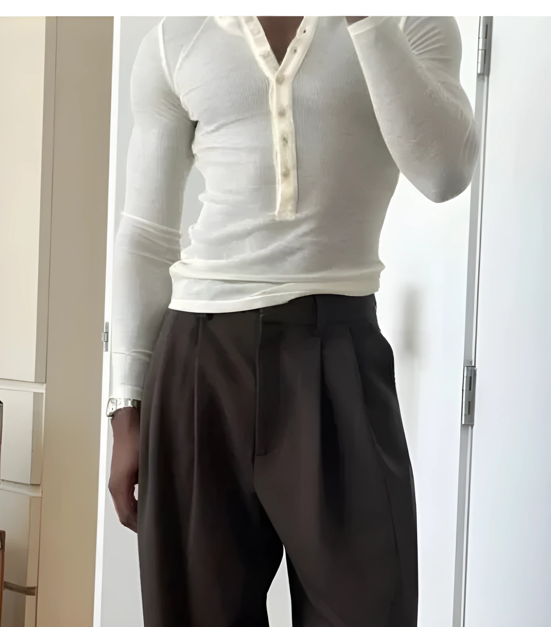 Men's cream apricot ribbed henley top with long sleeves and button placket