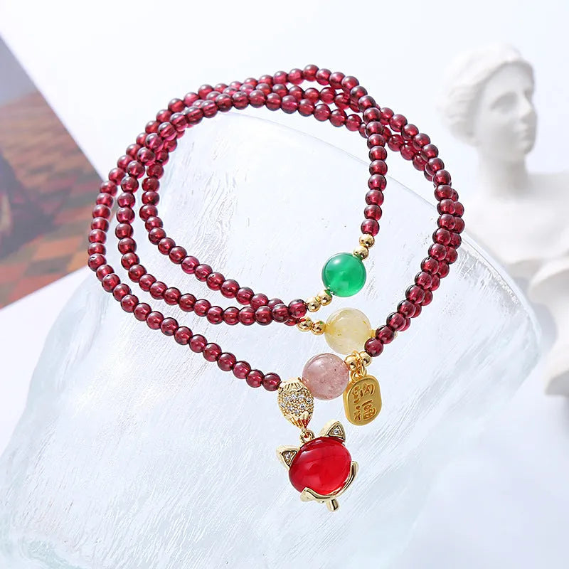 Purplish red garnet fox bracelet with adjustable cord for women