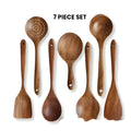 Wooden 7-piece kitchen utensil set with spoons and spatula in natural finish