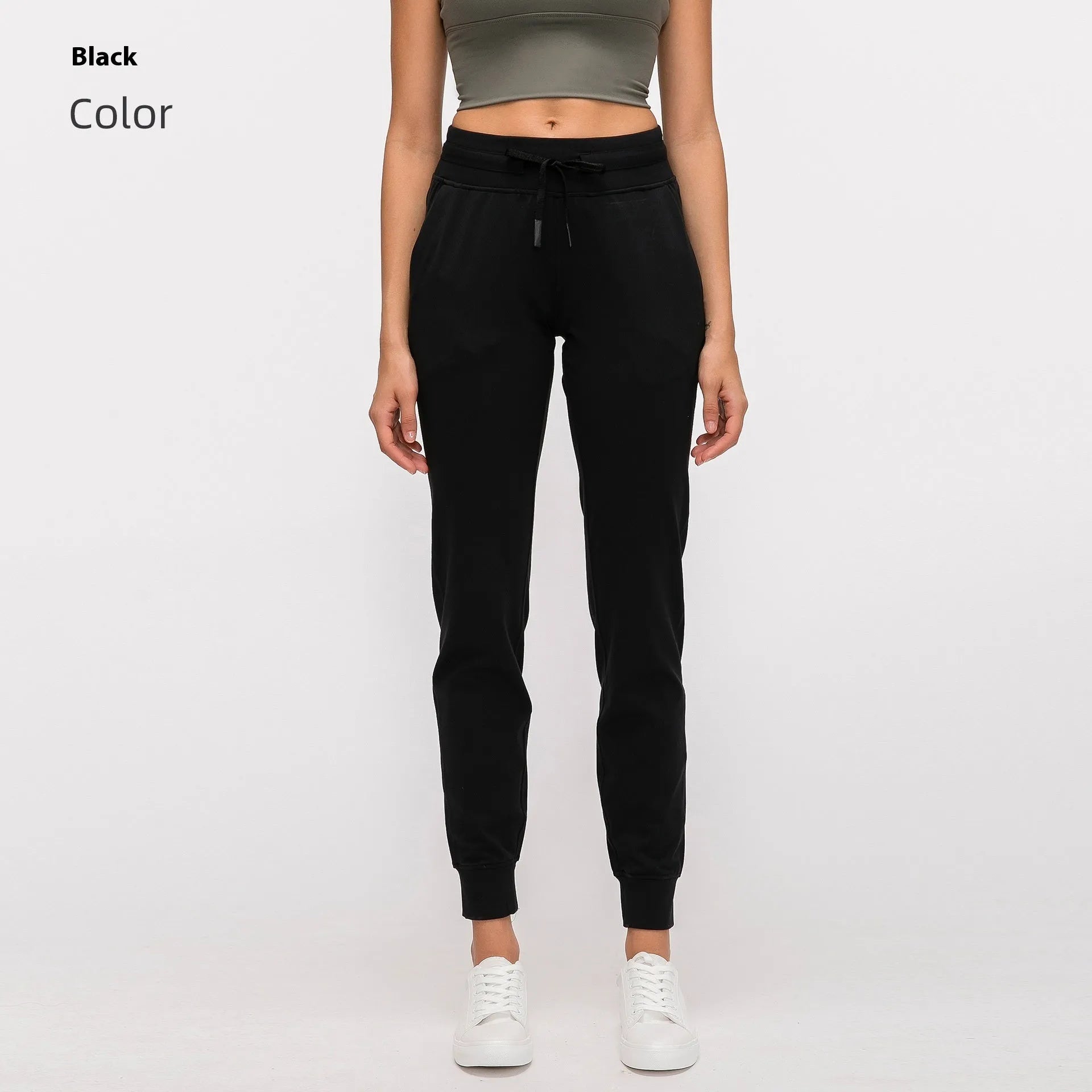 Women's high-waist yoga pants with drawstring waistband in a cotton blend fabric.