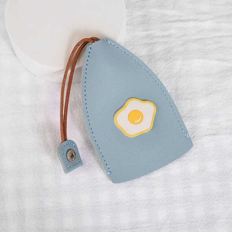 Cartoon pull-out key case in PU leather with colourful design, showing compact 14cm by 7.5cm dimensions