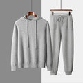 Men's light grey cashmere hoodie and trousers set for winter casual wear