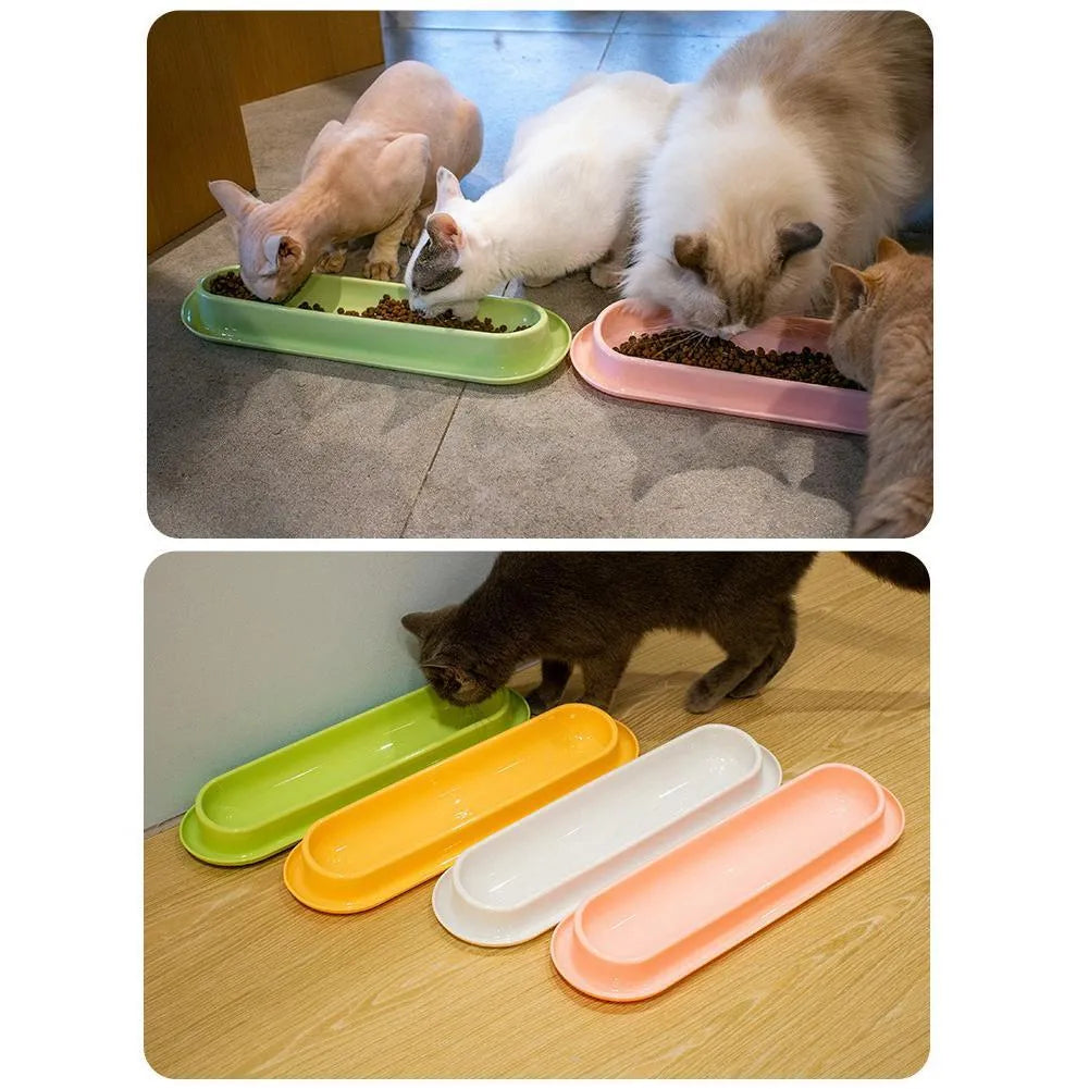 Green leakproof dual pet bowl feeder with non-slip base for dogs and cats.