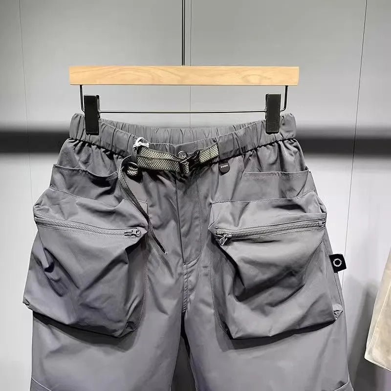 Men's large size work shorts with pockets in black or grey with loose fit design